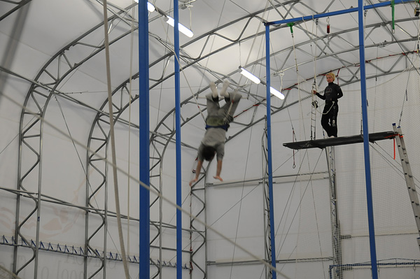 2011-03-27 SANCA School of Acrobatics and New Cirucs Arts in Seattle trapeze class hanging upside down by knees