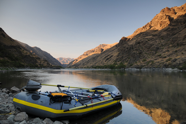 Hells Canyon Snake River raft shore sunset on hills