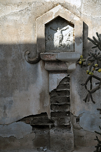 Mission San Xavier del Bac exterior wall detail near side chapel building in Tucson Arizona