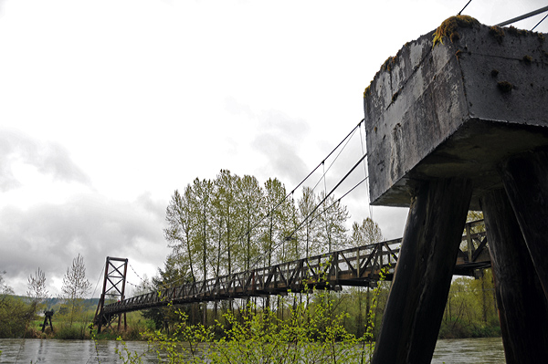 Tolt MacDonald Park pedestrian suspension bridge over Snoqualmie River in Carnation